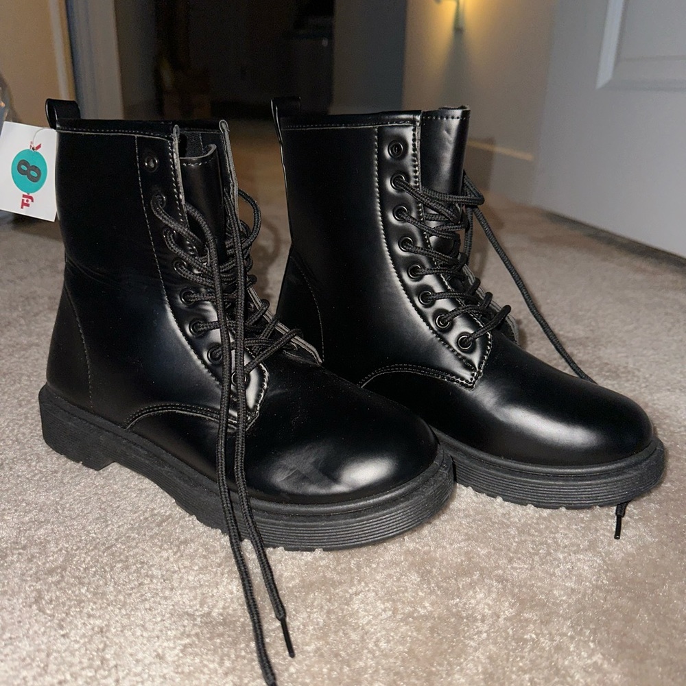 Black leather combat boots